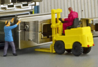Workmen and forklift